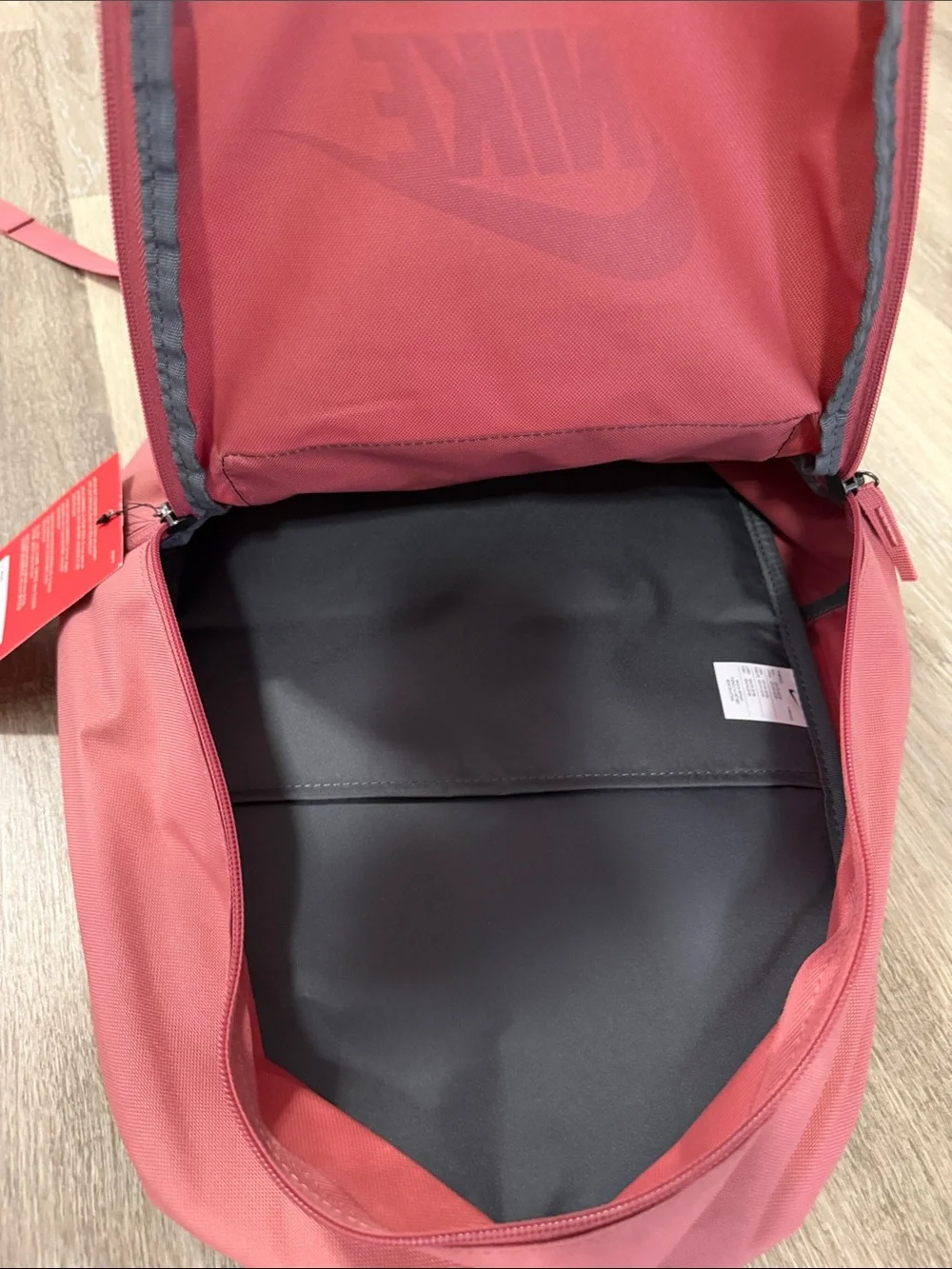 Nike Rose Pink Backpack with Dark Brown Front Pocket and White Logo